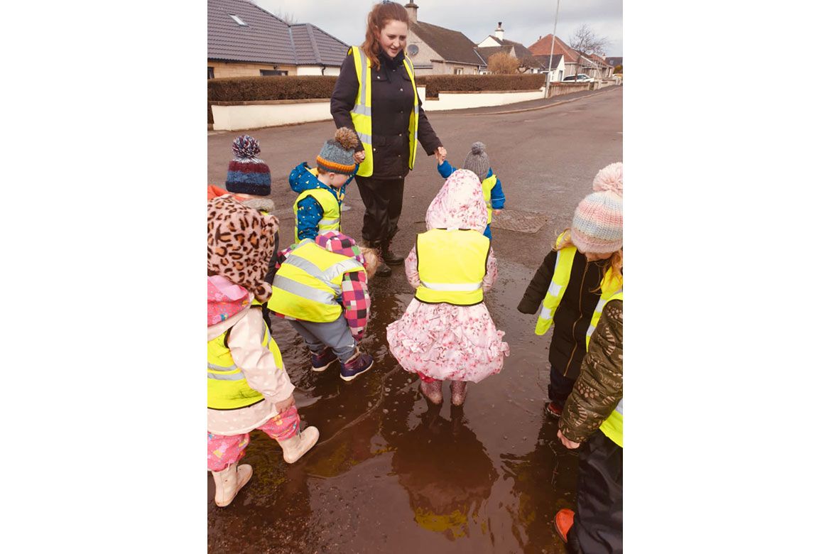 Children play in puddles
