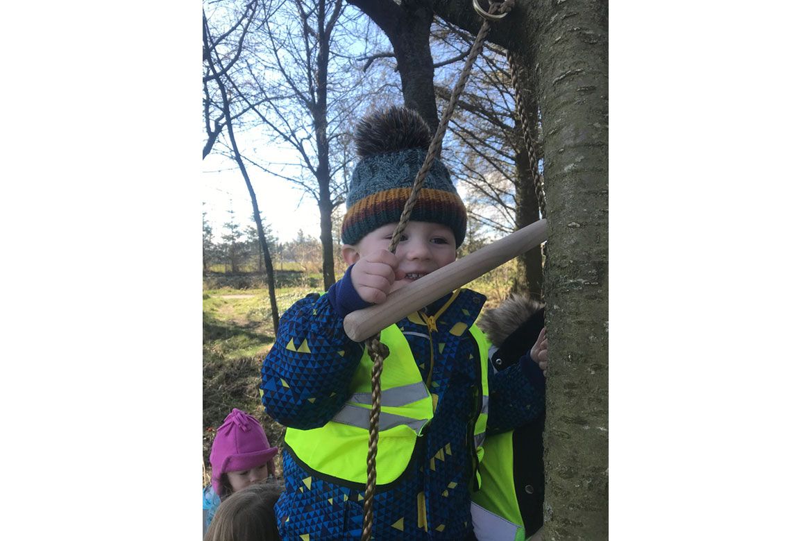 Climbing outdoors at Strathisla Children's Centre