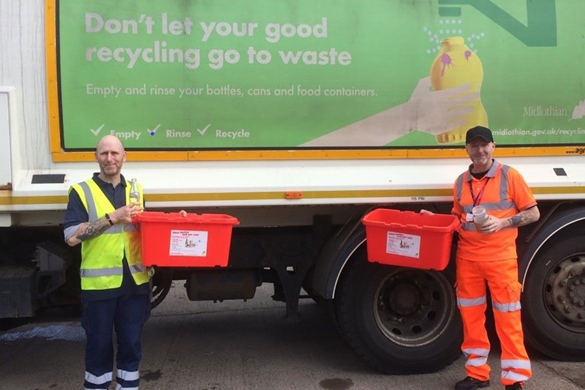 Colin Taylor and Gordon Coutts helping promote waste services restarting